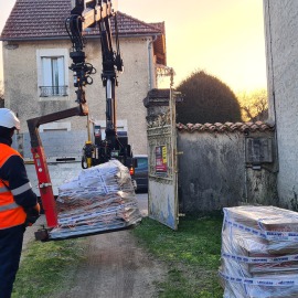Livraison de tuiles et velux
